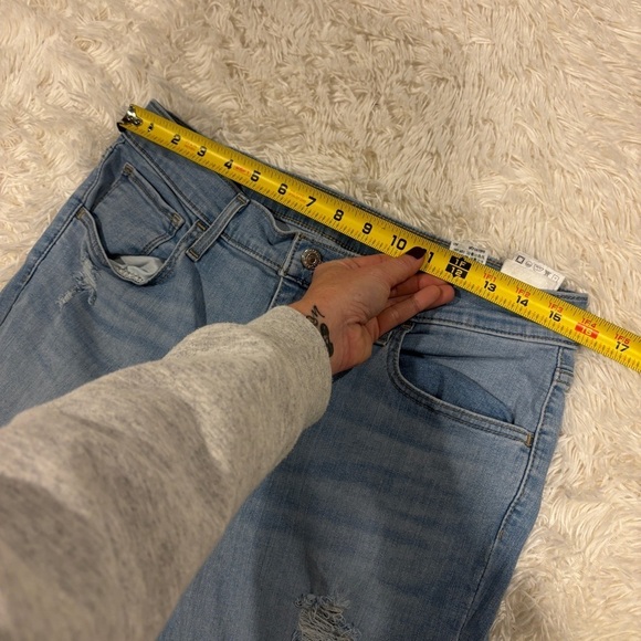 Levi’s 720 High Rise Super Skinny Distressed Raw Hem Light Wash Jeans Size 32 - Picture 5 of 12